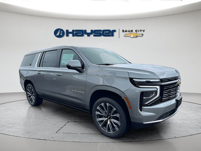 2026 Chevrolet Suburban High Country in Sterling Gray Metallic — front three-quarter view