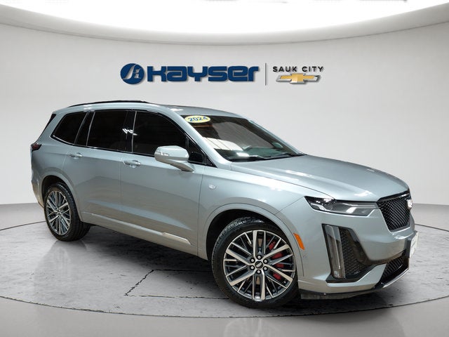 2024 Cadillac XT6 Sport in Argent Silver Metallic — front three-quarter view