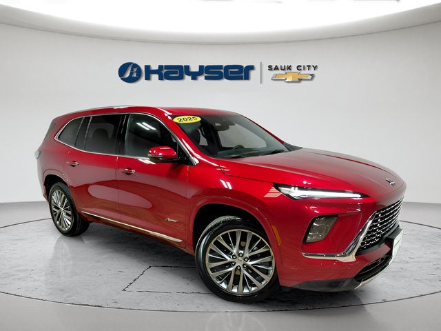 2025 Buick Enclave Avenir in Cherry Red Tintcoat — front three-quarter view